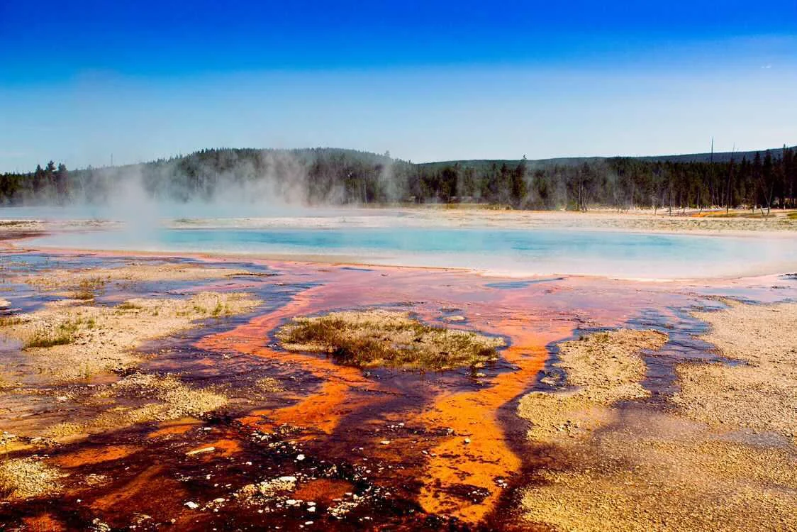 Vivid orange and turquoise hot spring steaming in Yellowstone National Park — Wyoming fine art print